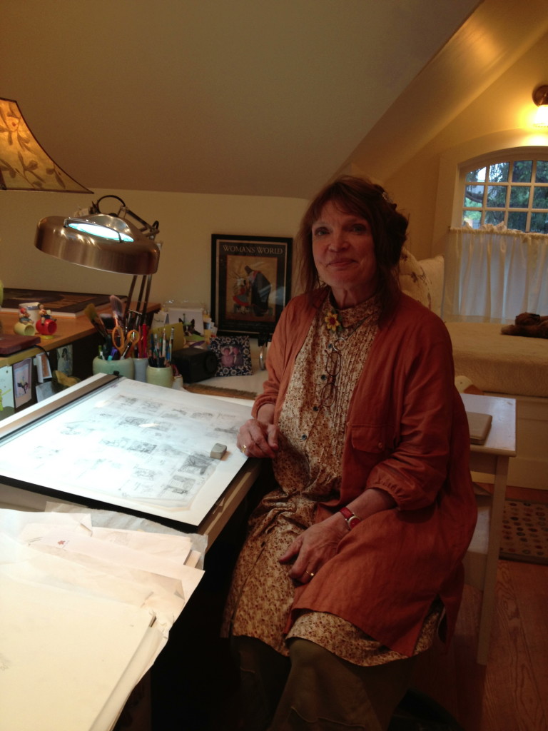 Jane at her drawing table working on the thumbnails of the book
