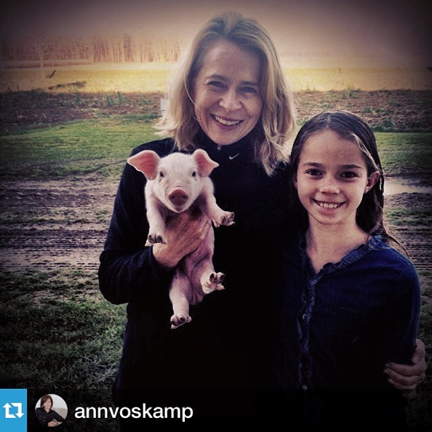 me and Ann's youngest daughter -- and a tiny piglet (we think might be Wilbur) on the morning I left